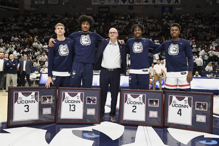 No. 18 UConn uses big second half to down No. 20 Providence