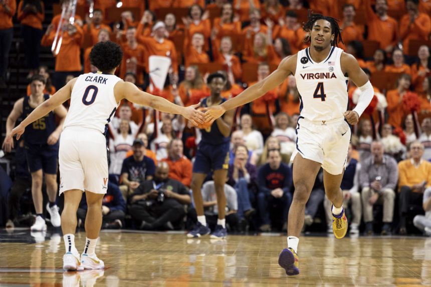 No. 7 Virginia slips past Irish 57-55 with Clark's late FTs