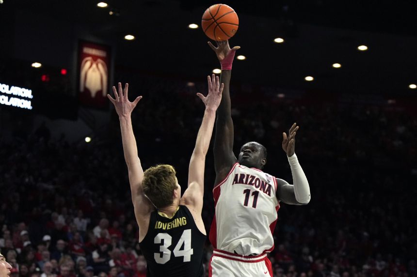 No. 8 Arizona's Ballo finds balance in basketball and life