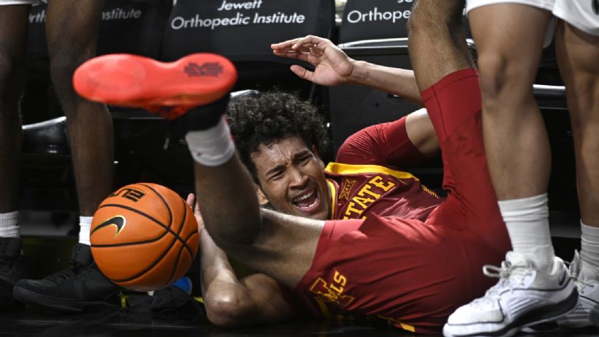 No. 8 Iowa State pulls away with late 11-0 run to beat UCF 60-52