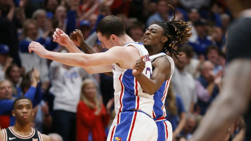 No. 8 Kansas easily defeats Oklahoma State 83-54 with balanced offense