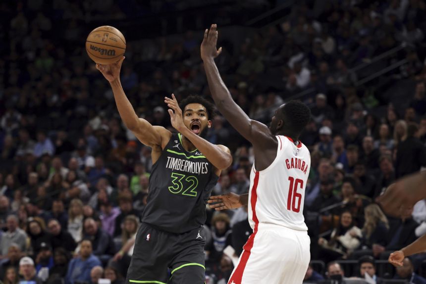 No Gobert; Towns leads Wolves to 129-117 win over Rockets