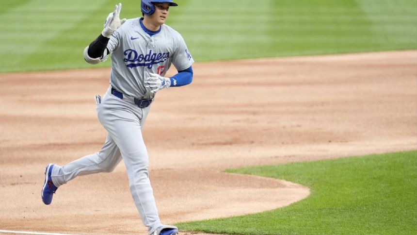 Ohtani hits a leadoff homer for the Dodgers to extend RBI streak to a career-high 9 games