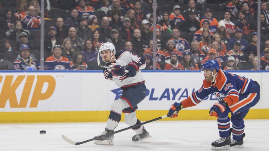 Oilers beat Blue Jackets 4-1 for 14th straight victory, close within 3 wins of the NHL record