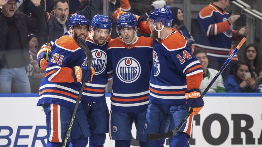 Oilers win team-record 11th straight, rally to beat skidding Maple Leafs 4-2