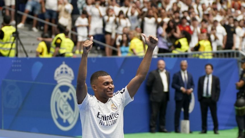 On 'incredible day,' Kylian Mbappe welcomed by Real Madrid fans at packed Santiago Bernabeu Stadium