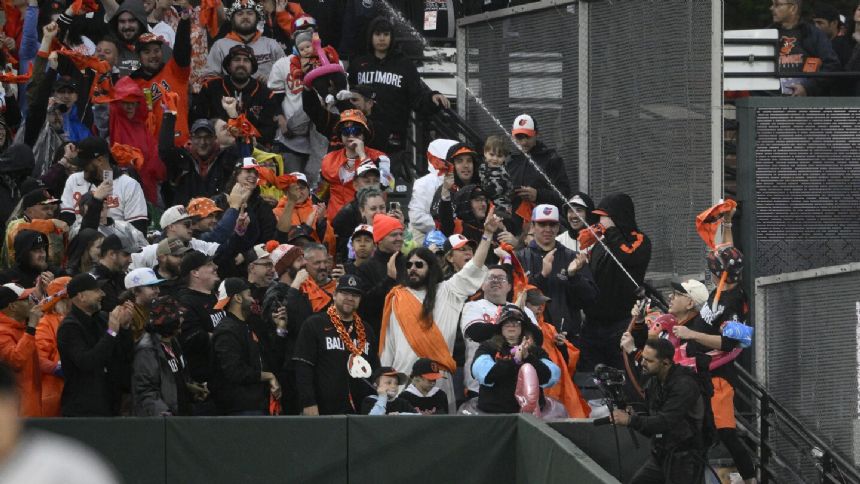 Orioles owner takes a turn in the Camden Yards 'Splash Zone' -- and the team quickly scores twice