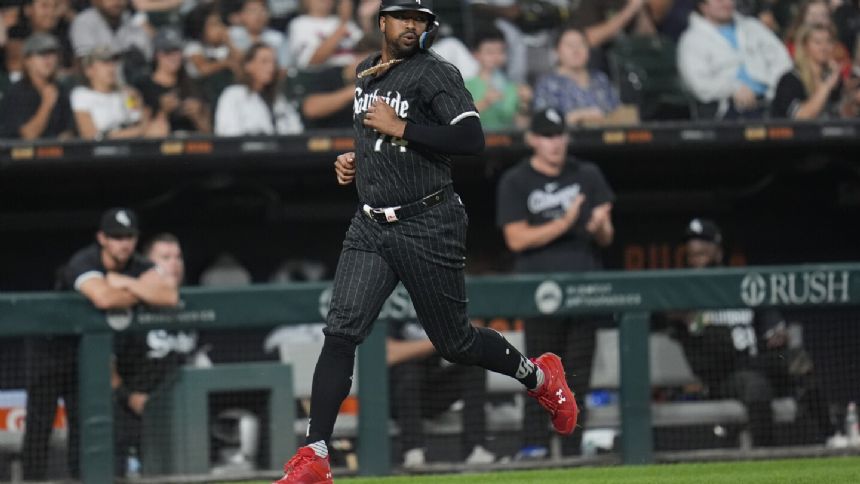 Orioles receive OF Eloy Jimenez from the Chicago White Sox, OF Austin Slater from Cincinnati