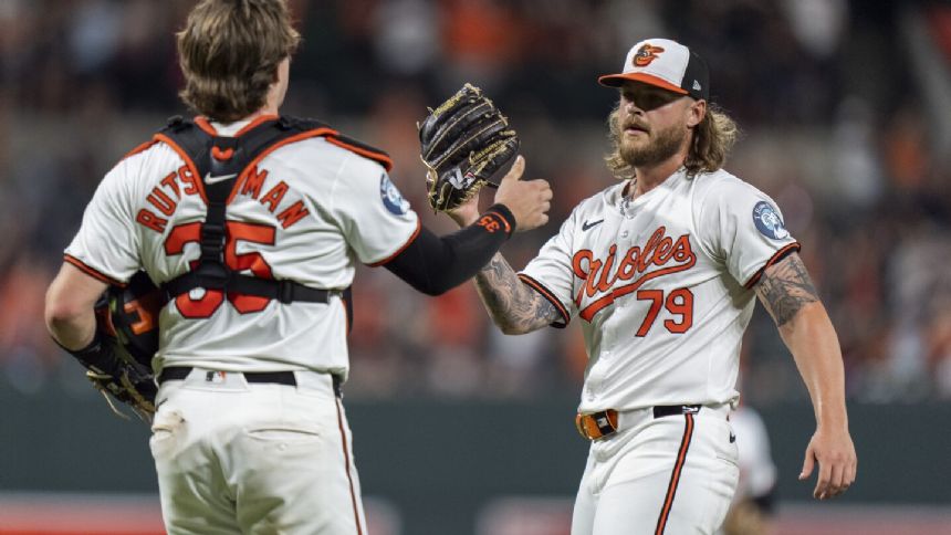 Orioles rout struggling Rangers 11-2