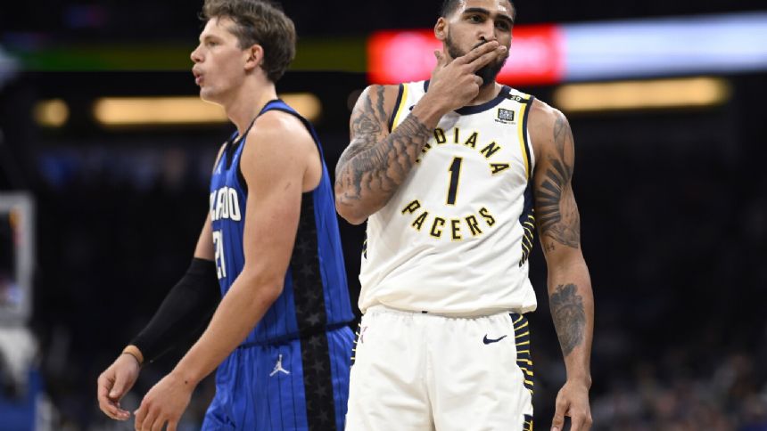 Pacers beat Orlando 111-97 to close within a game of the Magic in the Eastern Conference