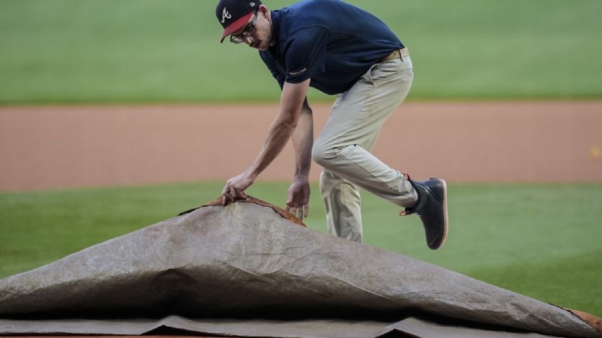 Padres-Braves game postponed by rain, lighting with doubleheader scheduled for Monday