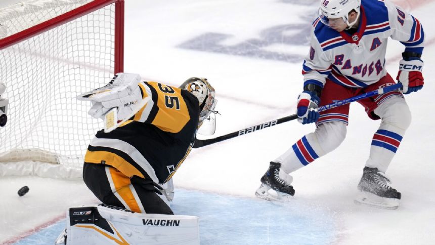 Panarin collects five points as surging Rangers race past reeling Penguins 7-4