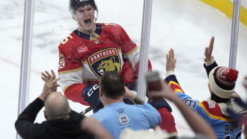 Panthers move into 1st in Eastern Conference with 3-2 OT win over Senators