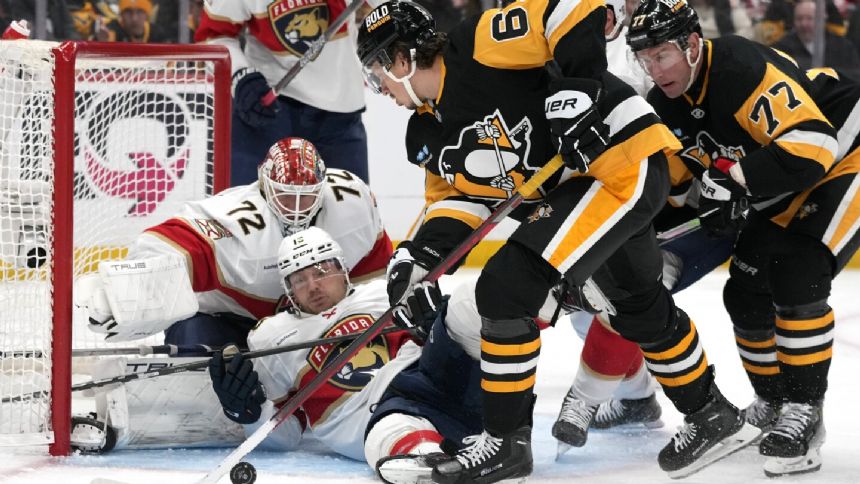 Panthers race by Penguins 5-2 to extend franchise-record road winning streak to 9