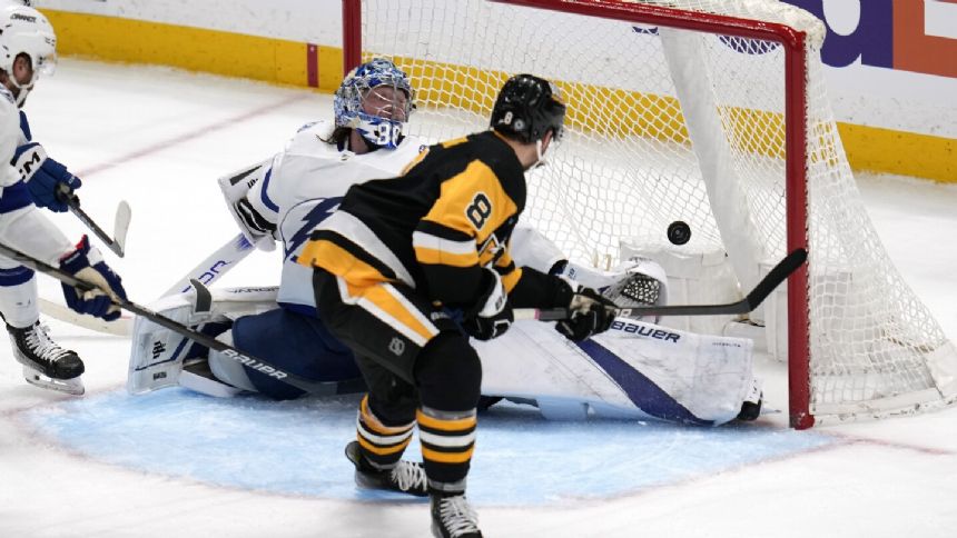 Penguins move into a playoff spot with 5-4 win over Lightning