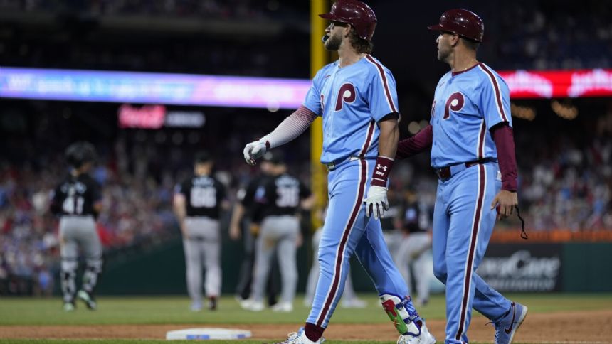 Phillies stars Bryce Harper and Kyle Schwarber both injured late in loss to Marlins