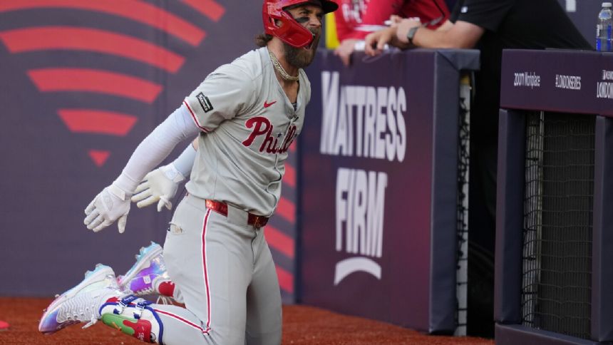 Phillies' Bryce Harper does soccer slide after tying home run against Mets in London