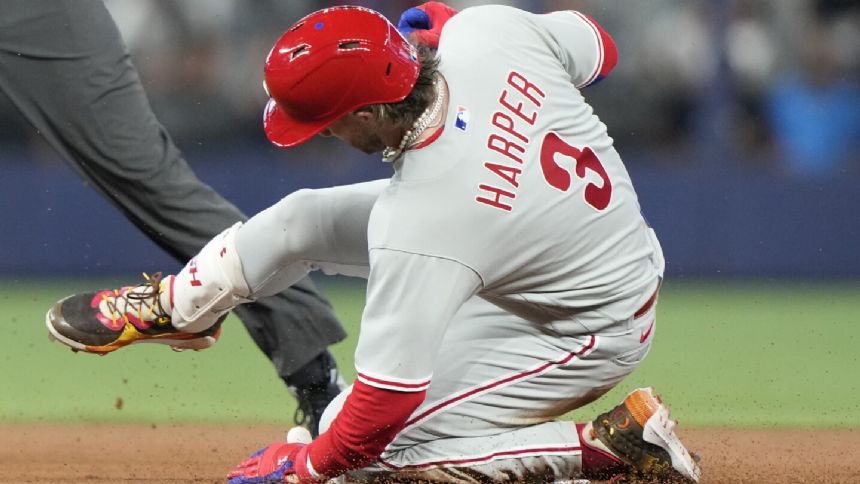 Phillies' Bryce Harper hit on surgically repaired elbow by pitch, leaves game
