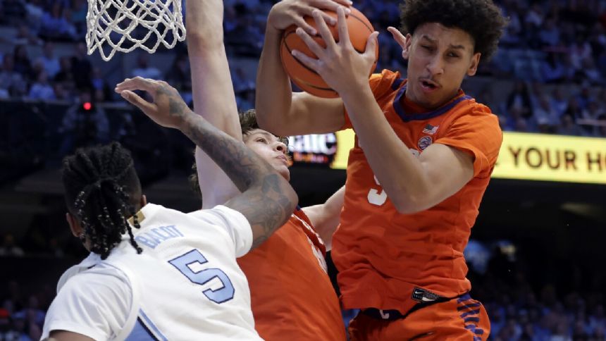 PJ Hall scores 25 points to lead Clemson to an 80-76 win over No. 3 North Carolina