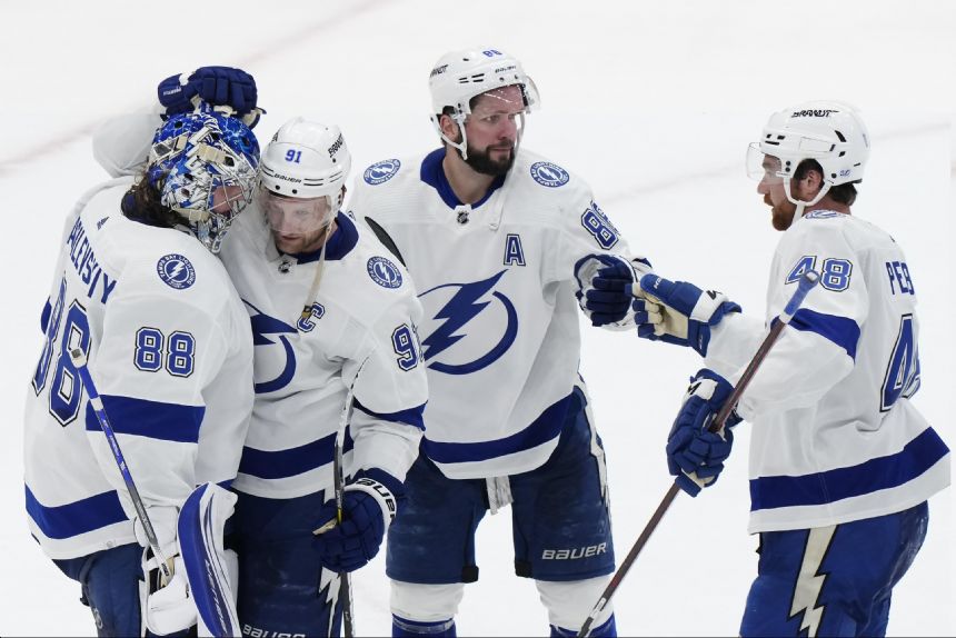 Point has 2 goals, Lightning beat Maple Leafs 7-3 in Game 1