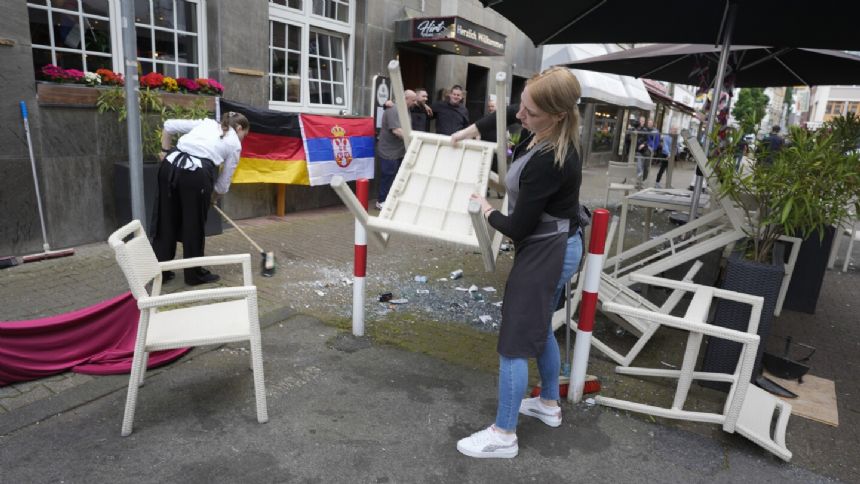 Police temporarily detain 8 after clash between Serbia and England fans at Euro 2024
