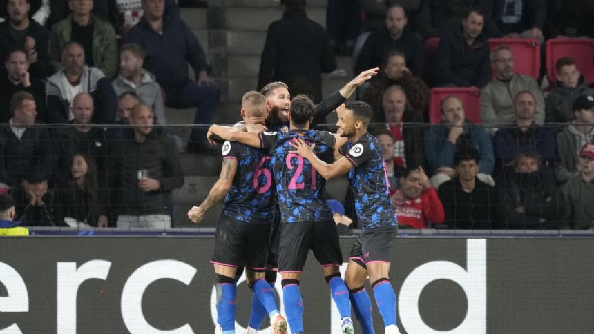 PSV scores in stoppage time to salvage 2-2 draw with Sevilla in Champions League