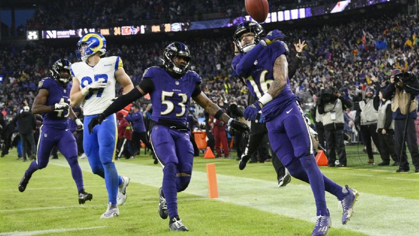 Ravens beat Rams 37-31 on Tylan Wallace's walk-off punt return in OT