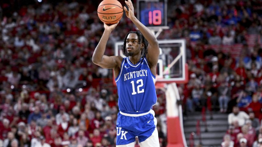 Reeves leads the way with 24 points and No. 6 Kentucky beats Arkansas 63-57