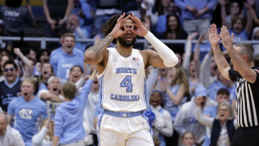 RJ Davis scores record-setting 42 points to lead No. 9 North Carolina over Miami 75-71