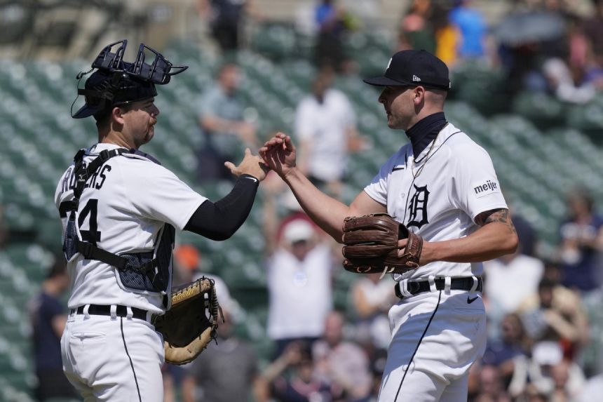 Rogers, Marisnick lead Tigers over Rangers 3-2