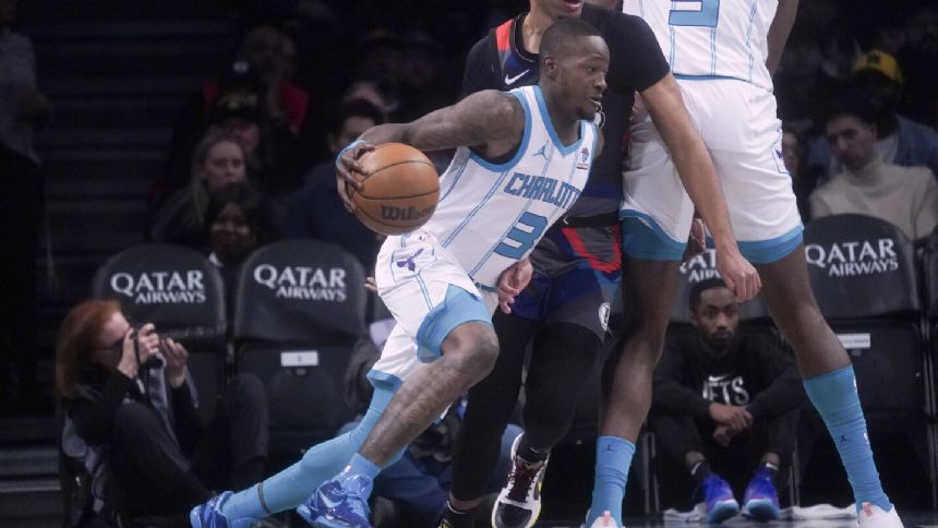 Rozier has 37 points and 13 assists, Hornets win 129-128 to snap Nets' three-game winning streak