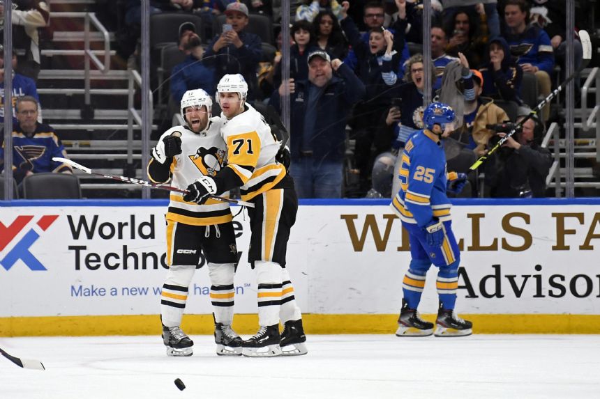 Rust's overtime goal lifts Penguins to 3-2 win over Blues