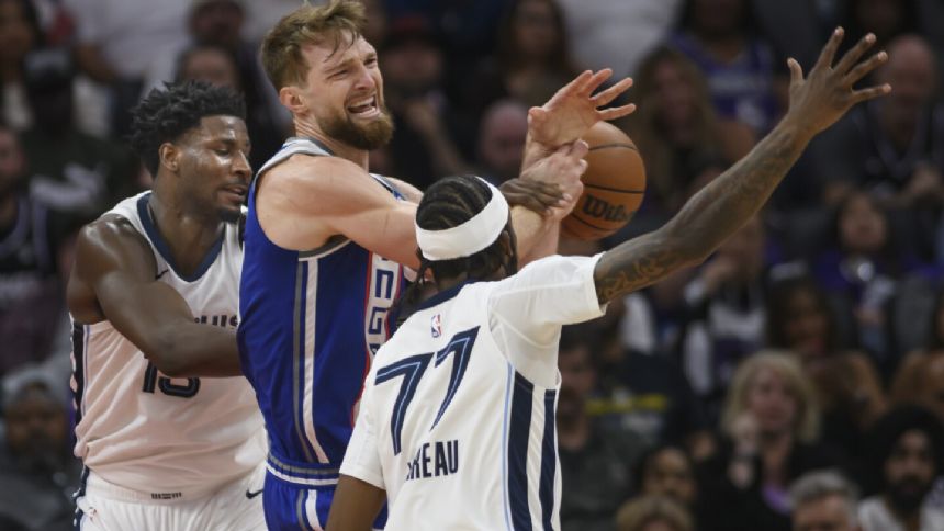 Sabonis records 50th straight double-double, Monk leads the way in OT as Kings beat Grizzlies