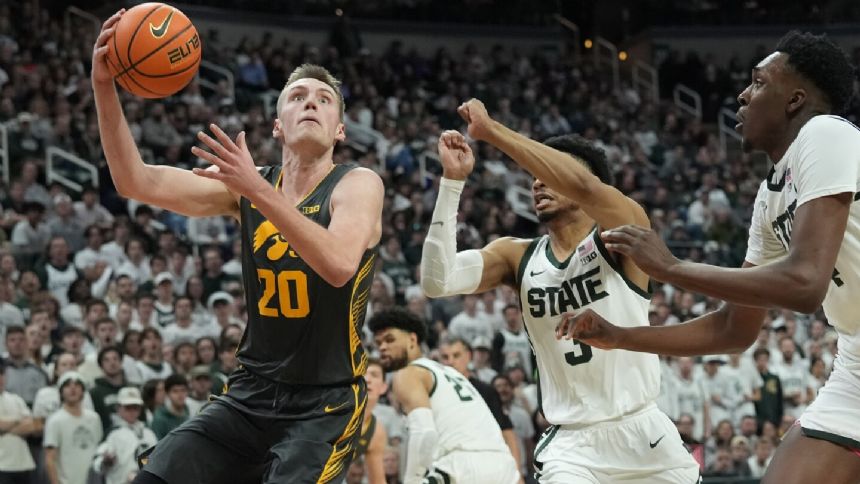 Sandfort scores 22 points, Krikke adds a double-double to lead Iowa past Michigan State 78-71