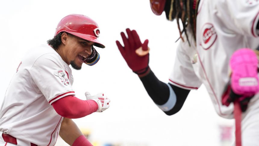 Santiago Espinal homers to extend hit streak to 10 games, Reds' bullpen holds on to beat Cubs 6-3