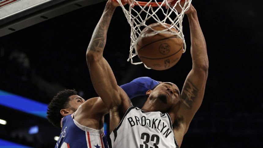 Schroder and Finney-Smith each score 20 in Nets' 112-107 win over the short-handed 76ers