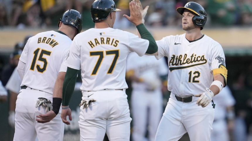 Schuemann homers, drives in 4 and Athletics beat Angels 13-3