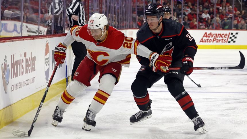 Sebastian Aho and Andrei Svechnikov have 3-point nights to lead the Hurricanes over the Flames 7-2