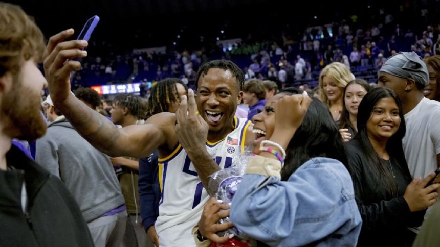 SEC fines LSU $100,000 for fans storming the court at end of upset of No. 17 Kentucky