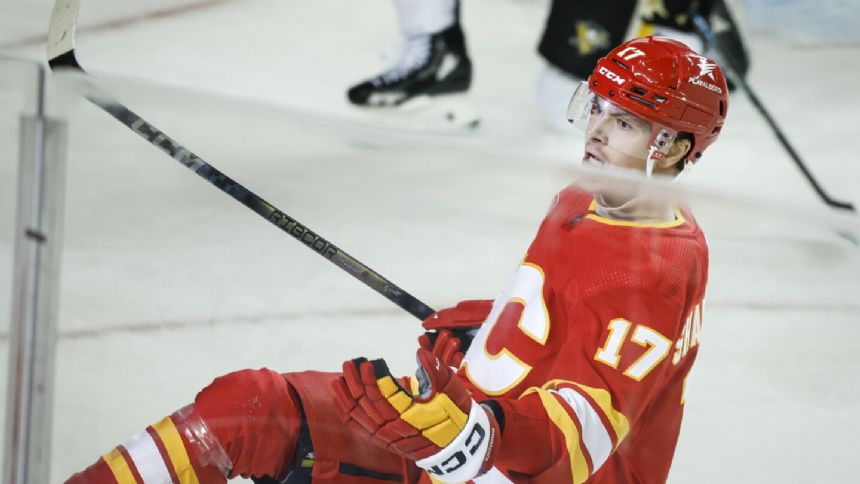 Sharangovich scores twice as Flames rally to beat Penguins 4-3