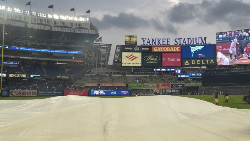 Some Yankee Stadium bleachers fans chant `U-S-A!' during `O Canada' before game against Blue Jays