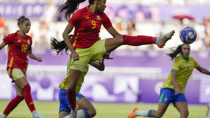 Spain tops group at the Olympics, Brazil's Marta sent off in last major tournament