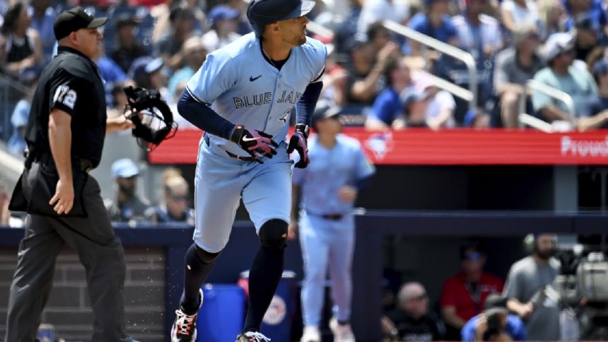 Springer hits 2 HRs and Clement gets tiebreaking hit as Blue Jays beat Tigers 5-4 to avoid sweep