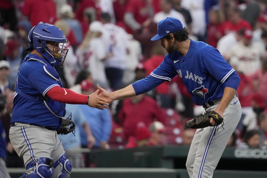 Springer's 5 hits help Jays outlast Cards 10-9 in opener