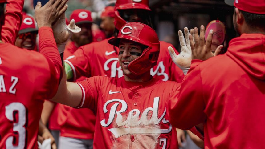Steer drives in 3 with 3 hits as Reds beat Winans, Braves 9-4 in first game of split doubleheader