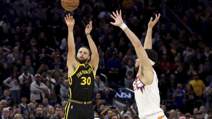 Stephen Curry hits 3-pointer with 0.7 seconds left, Warriors beat Suns 113-112