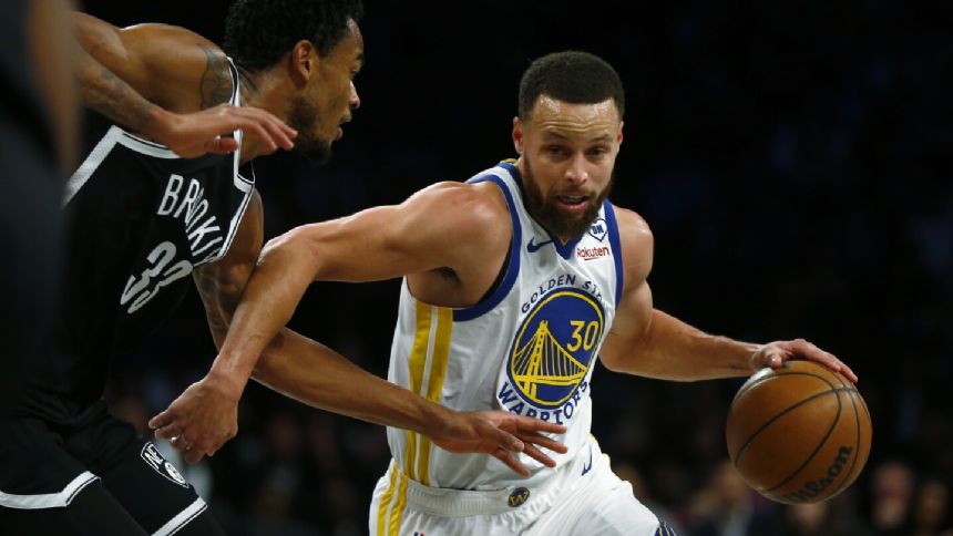 Stephen Curry scores 29 points, Warriors overcome slow start to beat the Nets 109-98