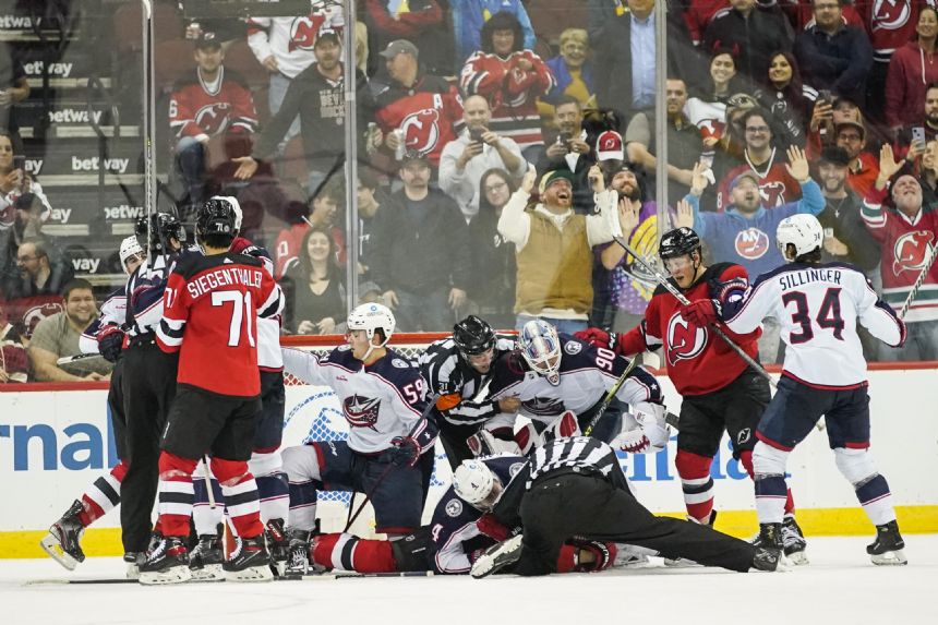 Surging Devils have 53 shots on goal, rout Blue Jackets 7-1