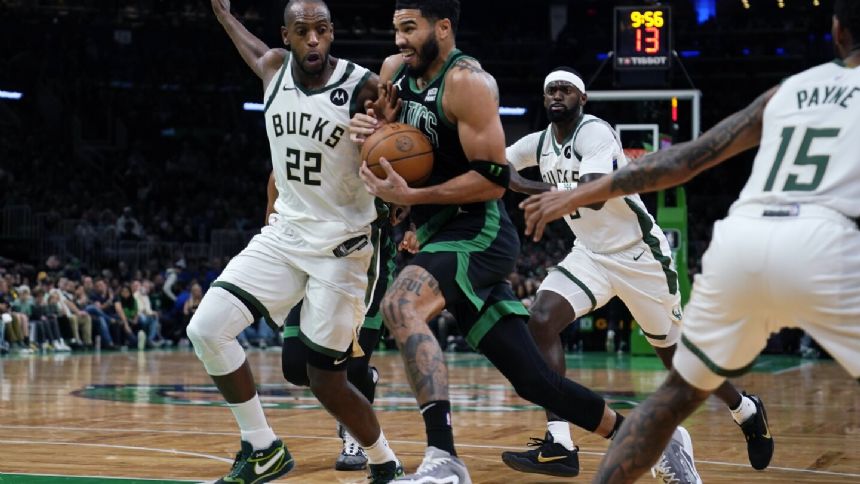 Tatum shakes off illness, helps Celtics slow Giannis and beat fellow East power Bucks 119-116