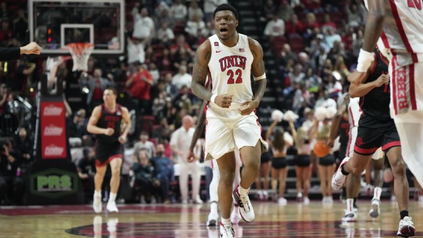 Thomas' 19 points and tiebreaking basket lead UNLV to 62-58 win over No. 21 San Diego State